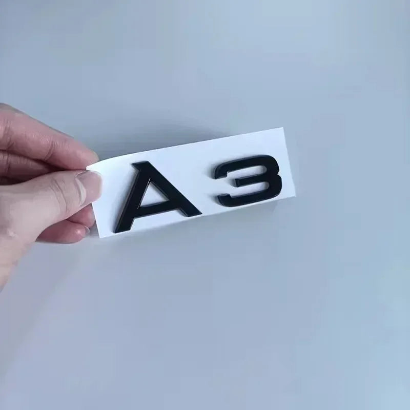 Logotipo de 4 anillos ABS negro capó de coche capó delantero parrilla maletero trasero emblema