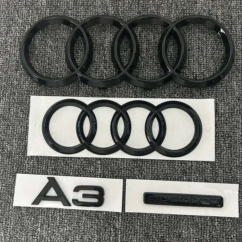 Logotipo de 4 anillos ABS negro capó de coche capó delantero parrilla maletero trasero emblema